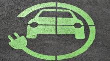 a green car charging logo